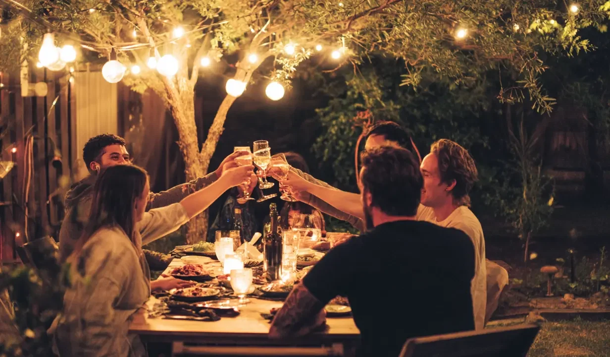 photo of friends celebrating outdoors