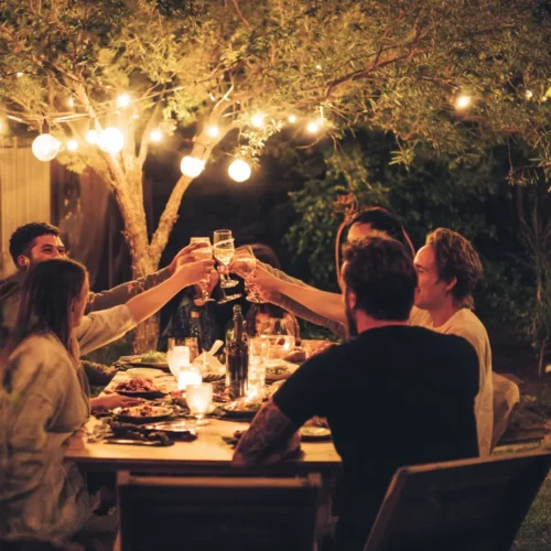 photo of friends celebrating outdoors