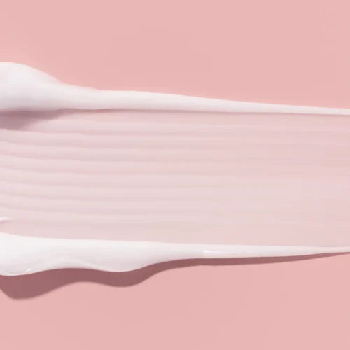 flat lay shot of a smear of moisturizer showing its luxe texture