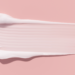 flat lay shot of a smear of moisturizer showing its luxe texture